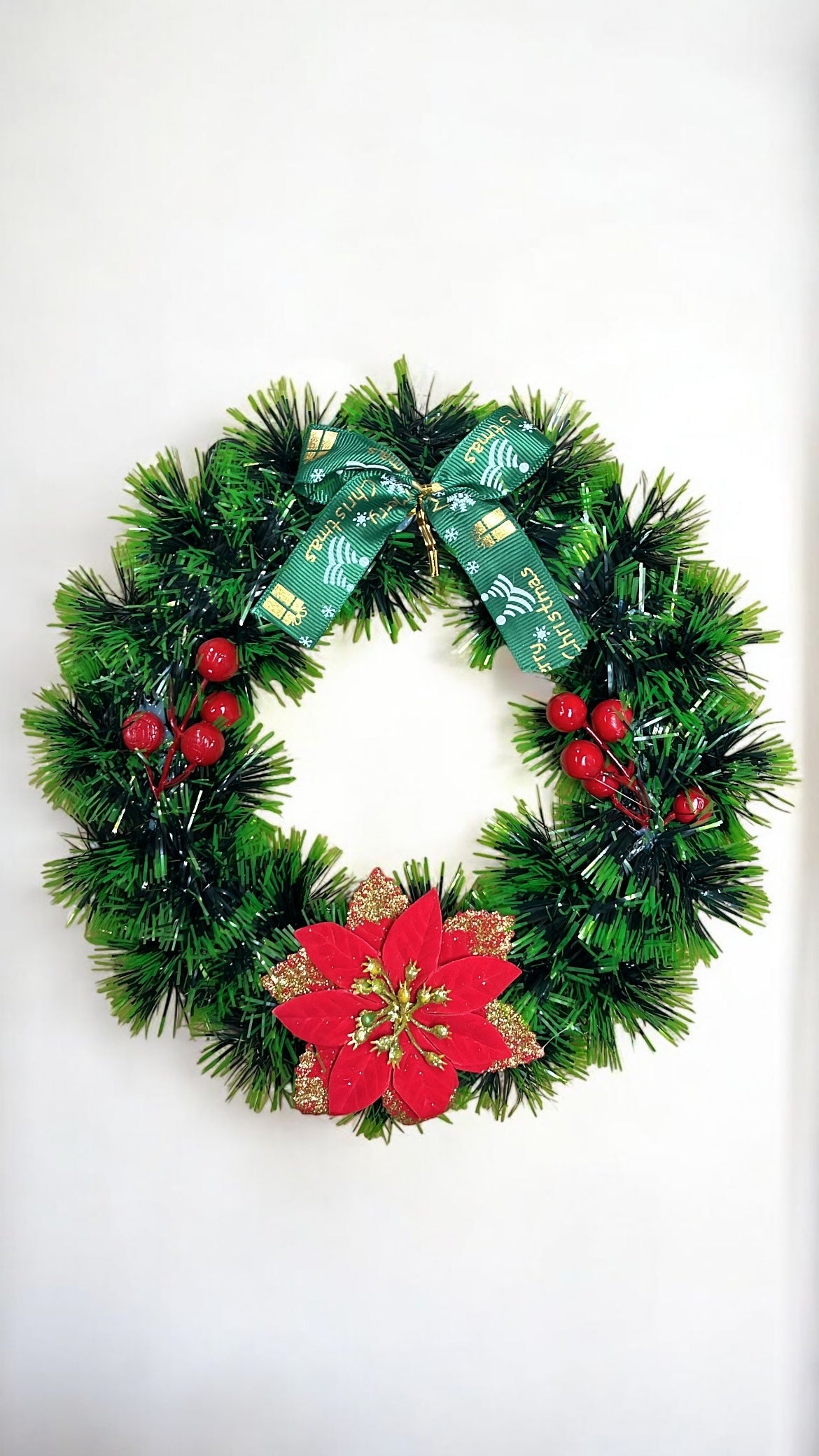 Corona navideña con flores y frutos 28cm (T289)